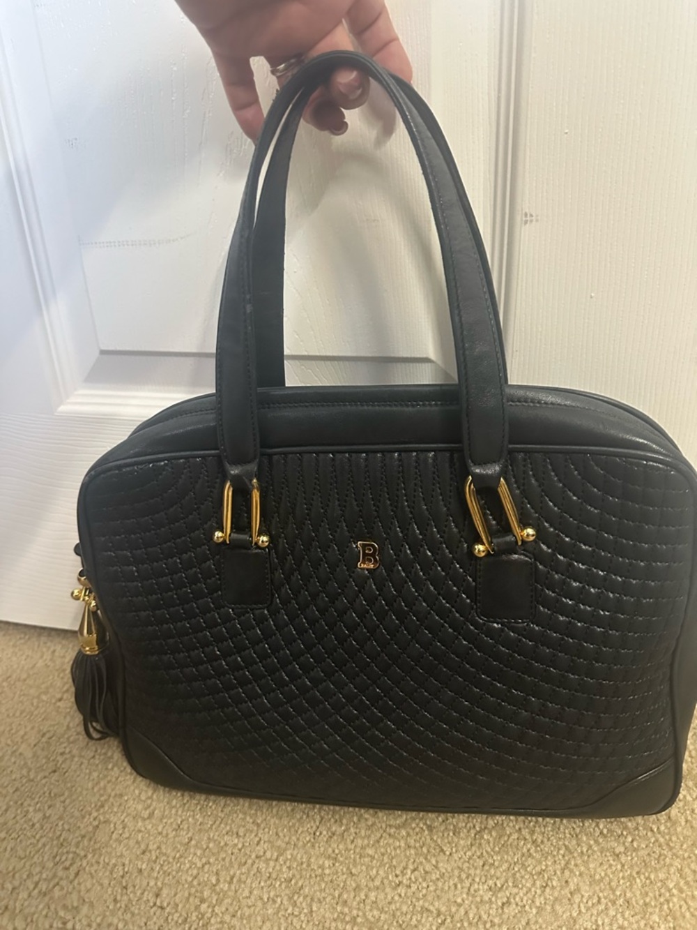 Bally’s Vintage Black Quilted Satchel with Gold Hardware by